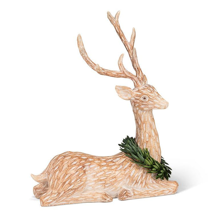 Deer Laying with Green Wreath