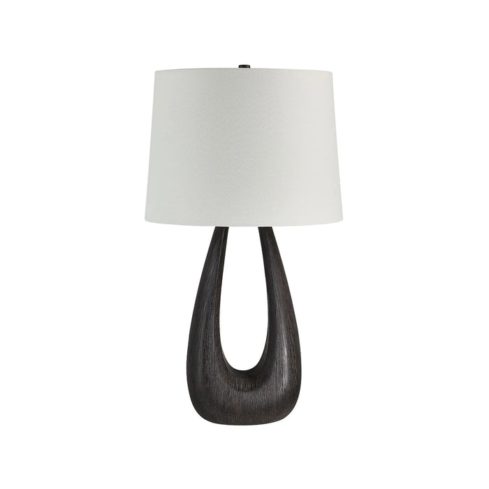 Table lamp with a dark wooden base and white lampshade on a white background