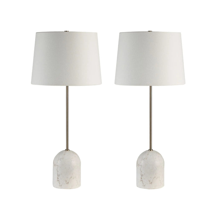 Set of two entryway table lamps with marble bases on a white background