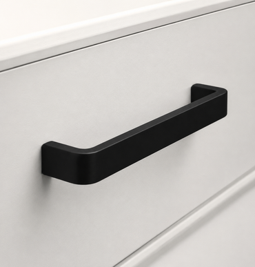 CBH 245 Square Return Bar cabinet pull in flat black finish installed on cabinet drawer
