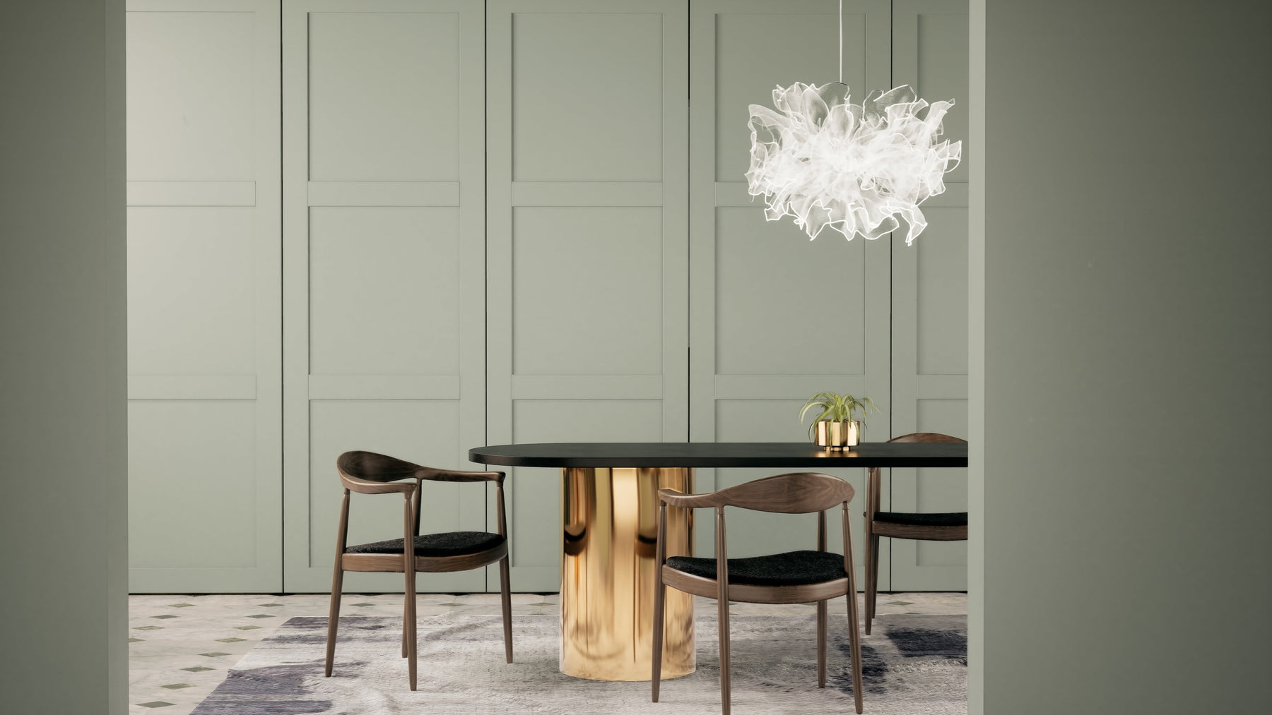 Modern dining area featuring a black and gold oval table, four sculpted wooden chairs, a white sculptural ceiling light, and sage green panelled walls.