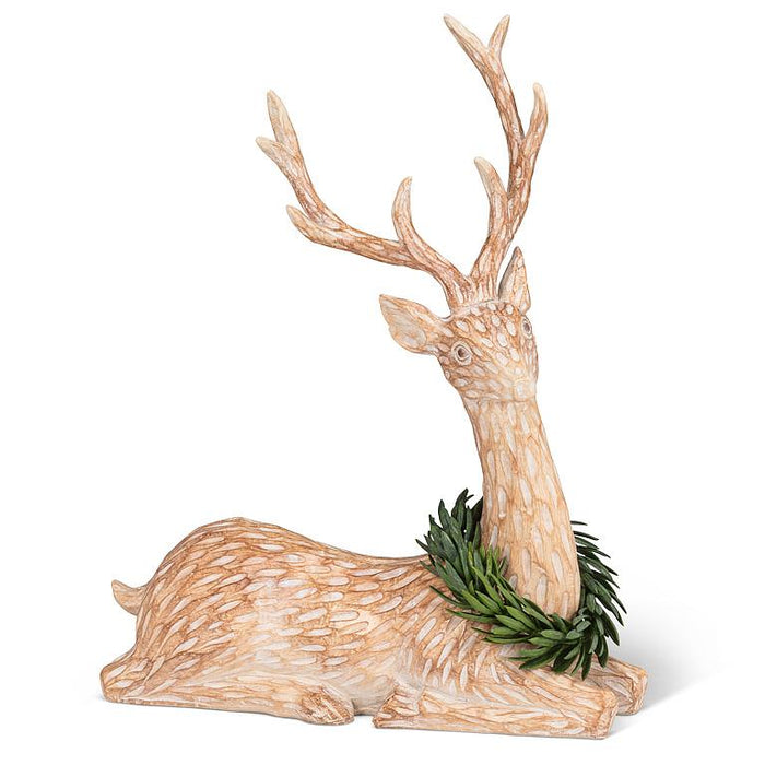 Deer Laying with Green Wreath