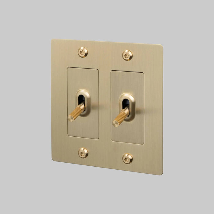 Buster + Punch 2-Gang Toggle Switch – Linear - Brass / Without Logo - 2G Toggle