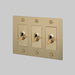 Buster + Punch 3-Gang Toggle Switch – Cross - Brass / With Logo - 3G Toggle