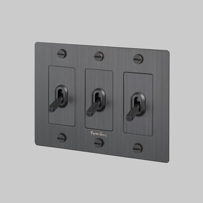 Buster + Punch 3-Gang Toggle Switch – Cross - Smoked Bronze / With Logo - 3G Toggle