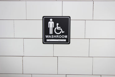 Frost 962 Washroom Signage- Male/Wheelchair with Braille Emboss, Black