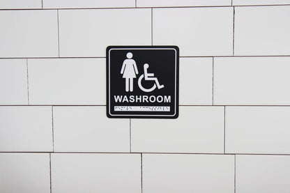 Frost 963 Washroom Signage- Female/Wheelchair with Braille Emboss, Black
