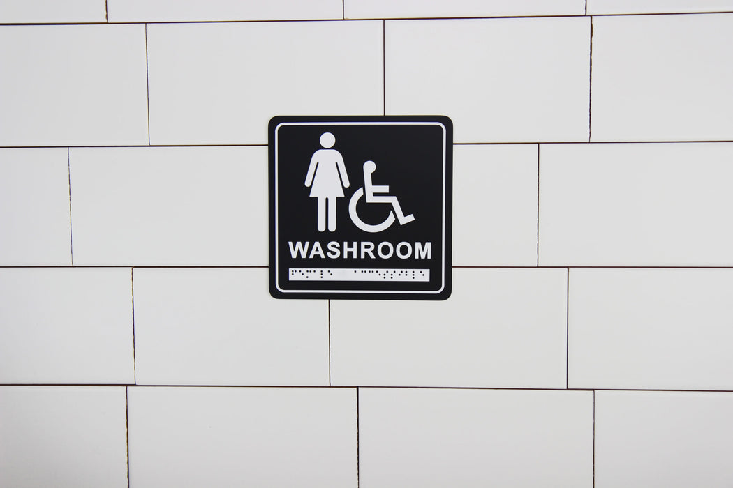Frost 963 Washroom Signage- Female/Wheelchair with Braille Emboss, Black