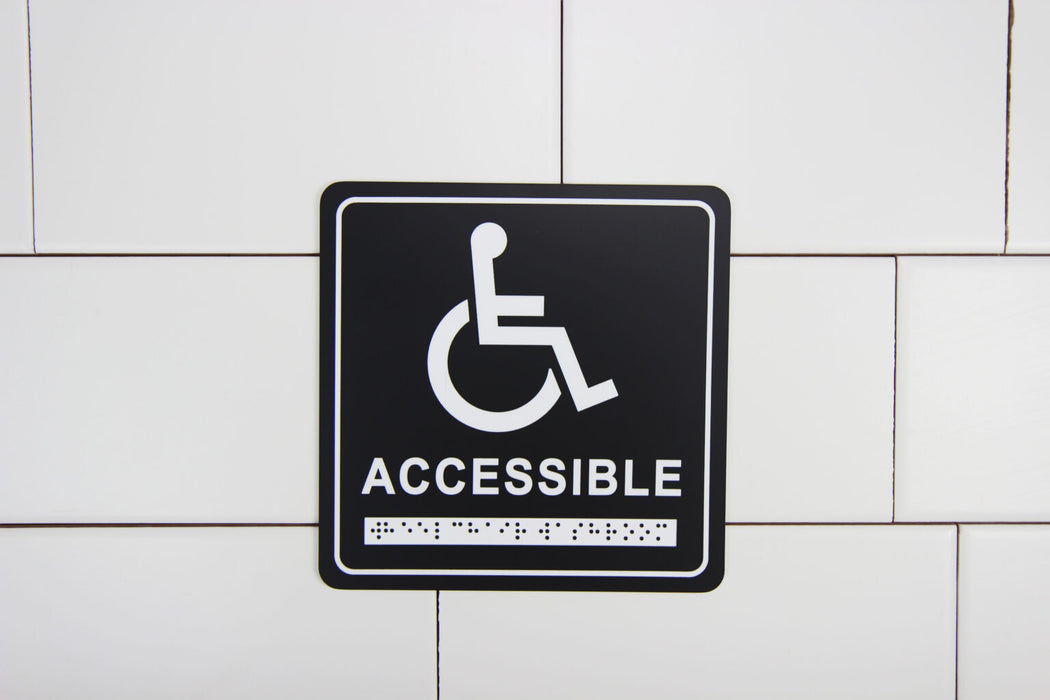 Frost 964 Washroom Signage – Wheelchair with Braille Emboss, Black