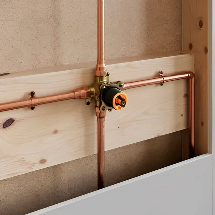 Pfister X8 Valve 0X8-310A series installed within an unfinished wall, connected to copper piping for a secure and reliable tub and shower plumbing setup