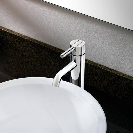 Top view of the Pfister Contempra single-control vessel bathroom faucet in polished chrome, positioned next to a white basin on a clean, modern countertop.