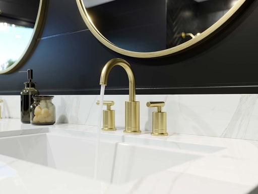 Pfister Contempra 2-handle 8-inch widespread bathroom faucet in brushed gold, installed on a white countertop in a contemporary bathroom, with water flowing smoothly from the spout.