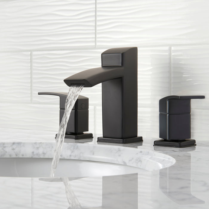 Pfister Kenzo 2-handle 8-inch widespread bathroom faucet in matte black, installed on a white countertop in a contemporary bathroom, with water gently flowing from the spout.