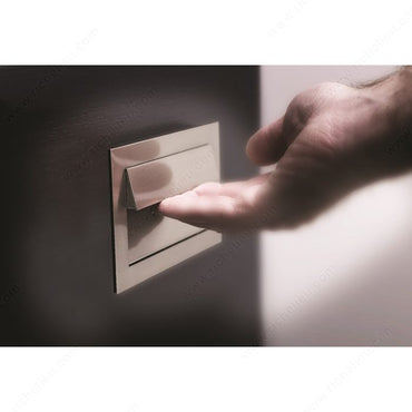 Richelieu 1011 modern recessed metal pull in brushed nickel side view showing recessed depth and sleek profile.