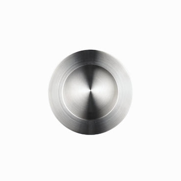 Richelieu 3402 modern recessed metal pull in brushed nickel top angle view showing circular recess and smooth profile.