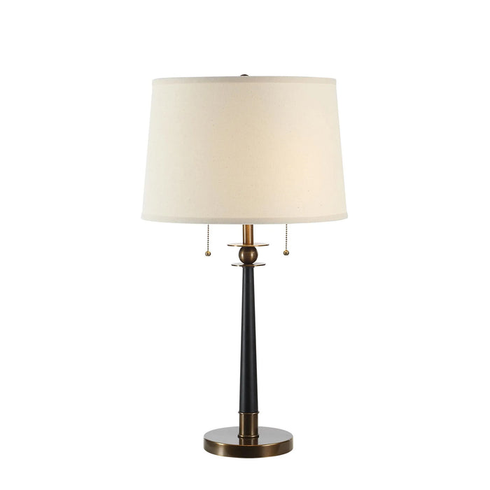 Console table lamp with a white shade on a white background