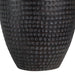 Textured black table lamp on a white background
