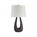 Table lamp with a dark wooden base and white lampshade on a white background