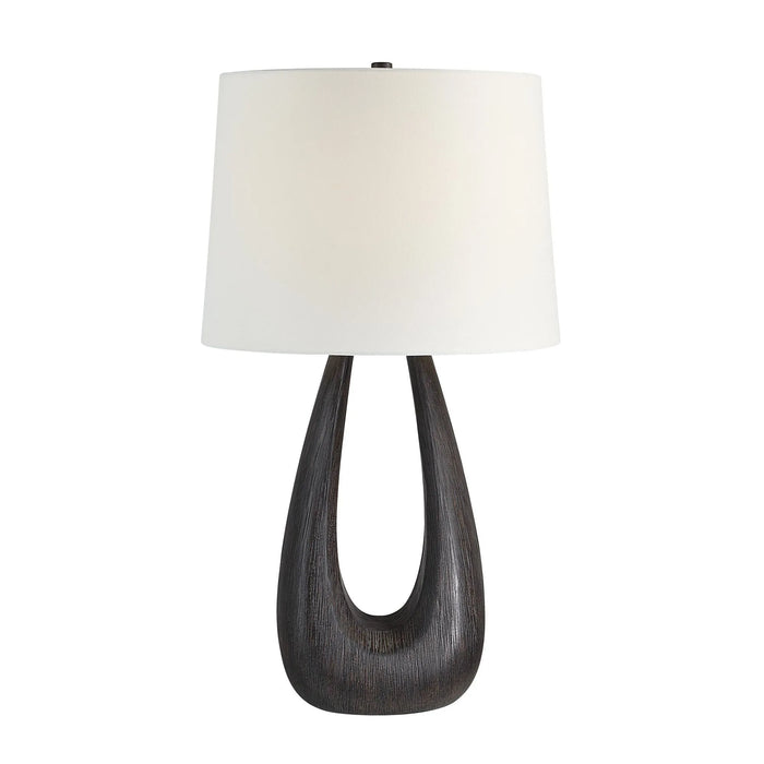 Living room accent table lamp with a dark wooden base and white lampshade on a white background
