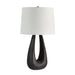 Table lamp with a dark wooden base and white lampshade on a white background