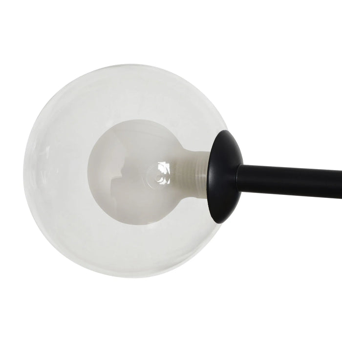 Close-up of a light bulb with a black base on a white background
