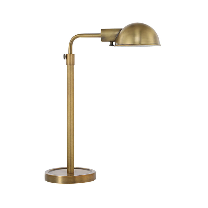 Brass desk lamp on a white background