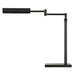Black adjustable desk lamp on a white background