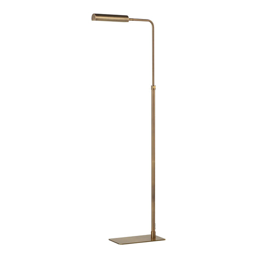 Antique brass reading floor lamp with adjustable arm on a white background
