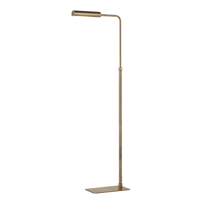 Antique brass reading  floor lamp on a white background