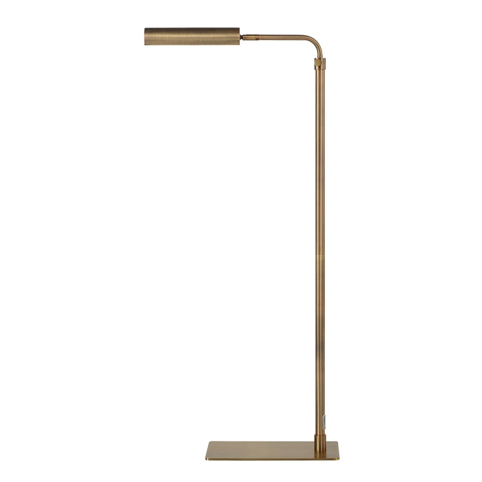 Antique brass floor lamp on a white background