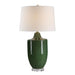 Green table lamp with a white shade on a white background