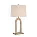 Table lamp with beige travertine finish and antique brushed brass base on a white background