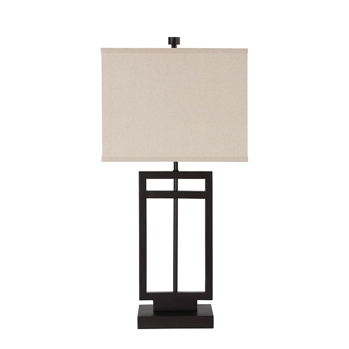 Table lamp with a beige rectangular shade on a white background