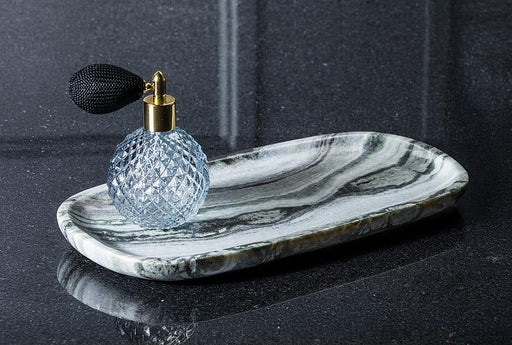 Small black marble tray styled with a decorative soap dispenser