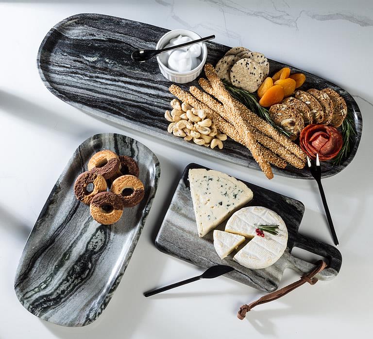 Abbott black marble trays styled with cheese, bread and appetizers
