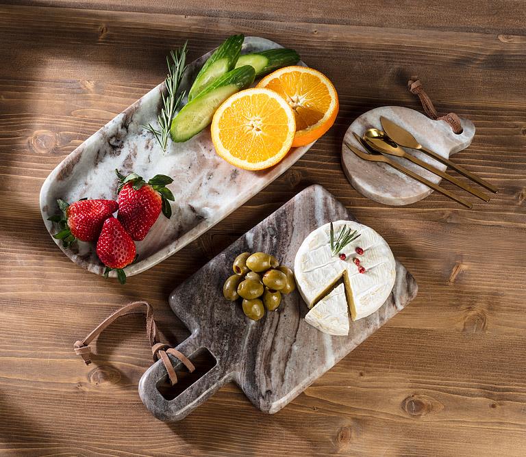 Abbott brown marble trays styled with fruit, cheese and appetizers