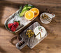 Abbott brown marble trays styled with fruit, cheese and appetizers