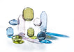 Assorted Abbott glass bud vases displayed together in a decorative arrangement