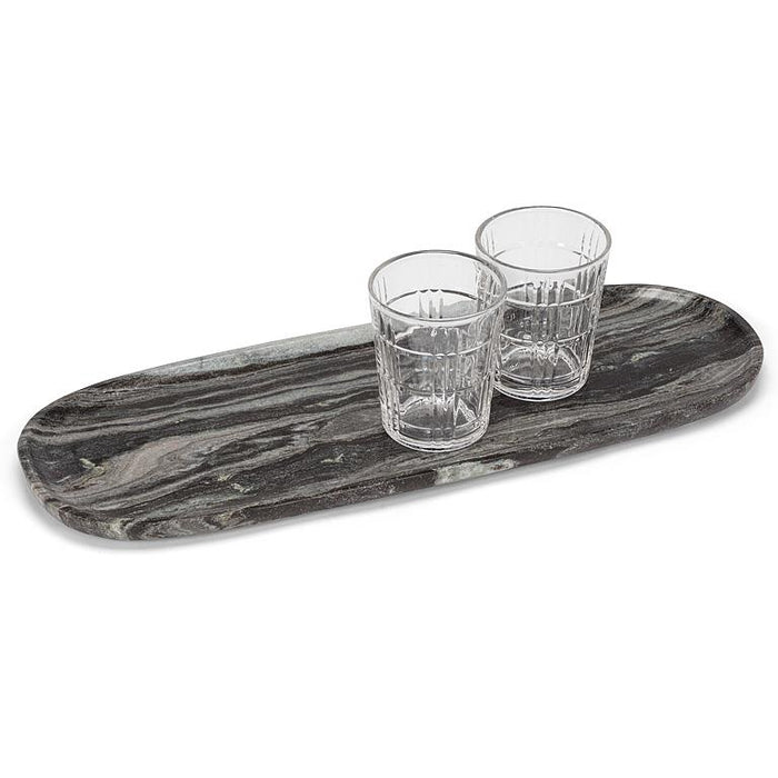 Large black marble serving tray styled with two drinking glasses
