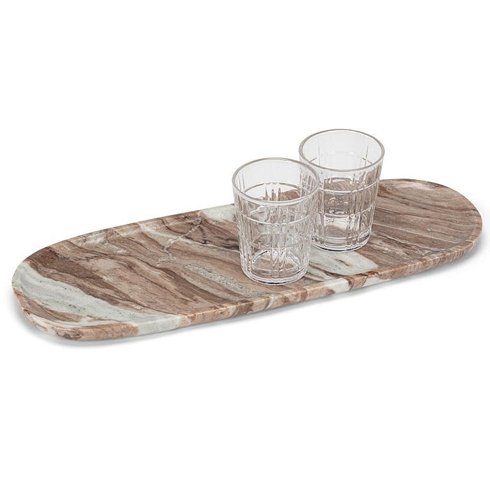 Large brown marble serving tray styled with two drinking glasses