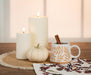 Set of six stoneware leaf mugs styled on an autumn table