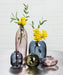 Abbott decorative glass bud vase collection displayed with fresh flowers and greenery
