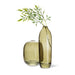 Abbott moss green glass bud vase displayed alongside a coordinating decorative vase