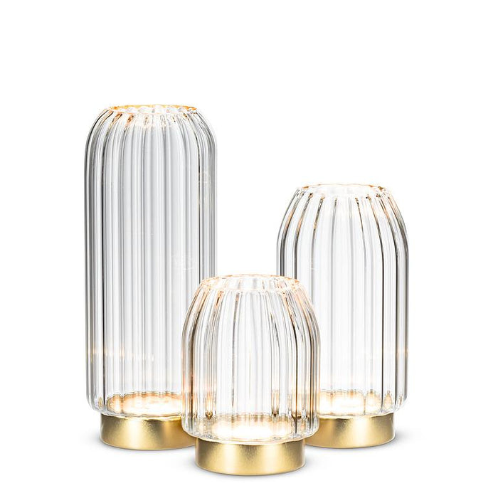 Abbott illuminated glass vases displayed together in three coordinating sizes