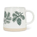 Front view of Abbott 14 oz wide-base stoneware mug with green pinecones and evergreen branches