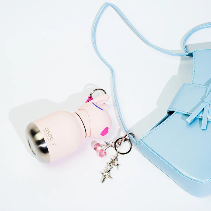 Asobu Mini Besties Bunny bottle attached to keys with built-in key ring