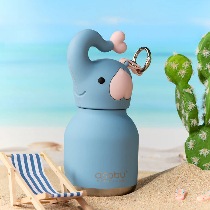Asobu Mini Elephant Besties insulated water bottle on a beach with summer accessories