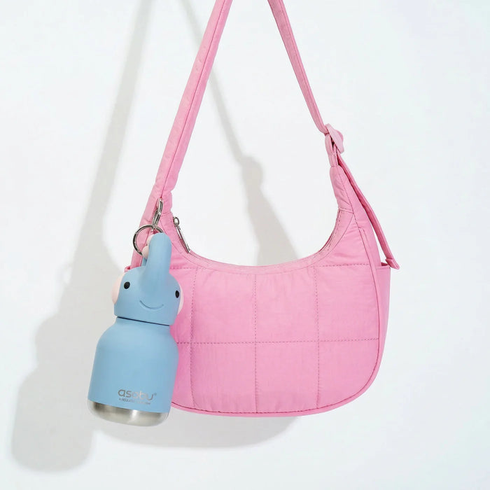 Asobu Mini Elephant Besties water bottle clipped to a pink handbag using the built-in key ring