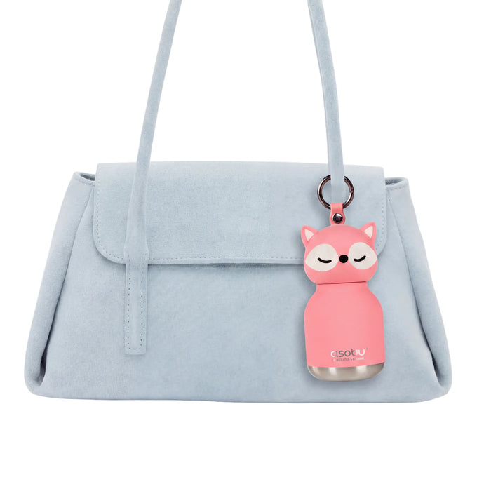 Asobu Mini Fox Bestie water bottle attached to a handbag with built-in key ring