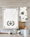 Bee crest kitchen towel set displayed in modern kitchen with wooden board and white kitchen accessories